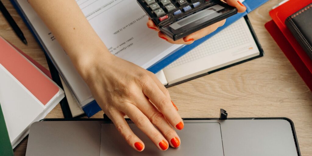 A small business owner works on their business's financials.