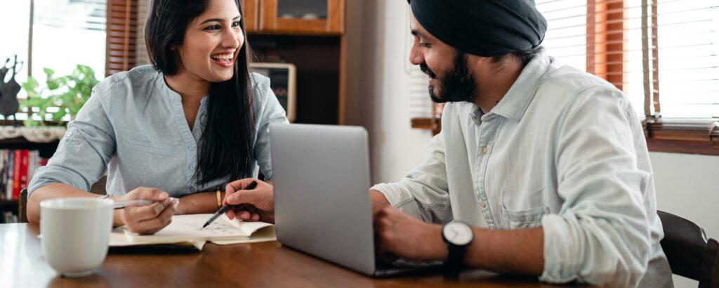 Two small business owners working together on their business.